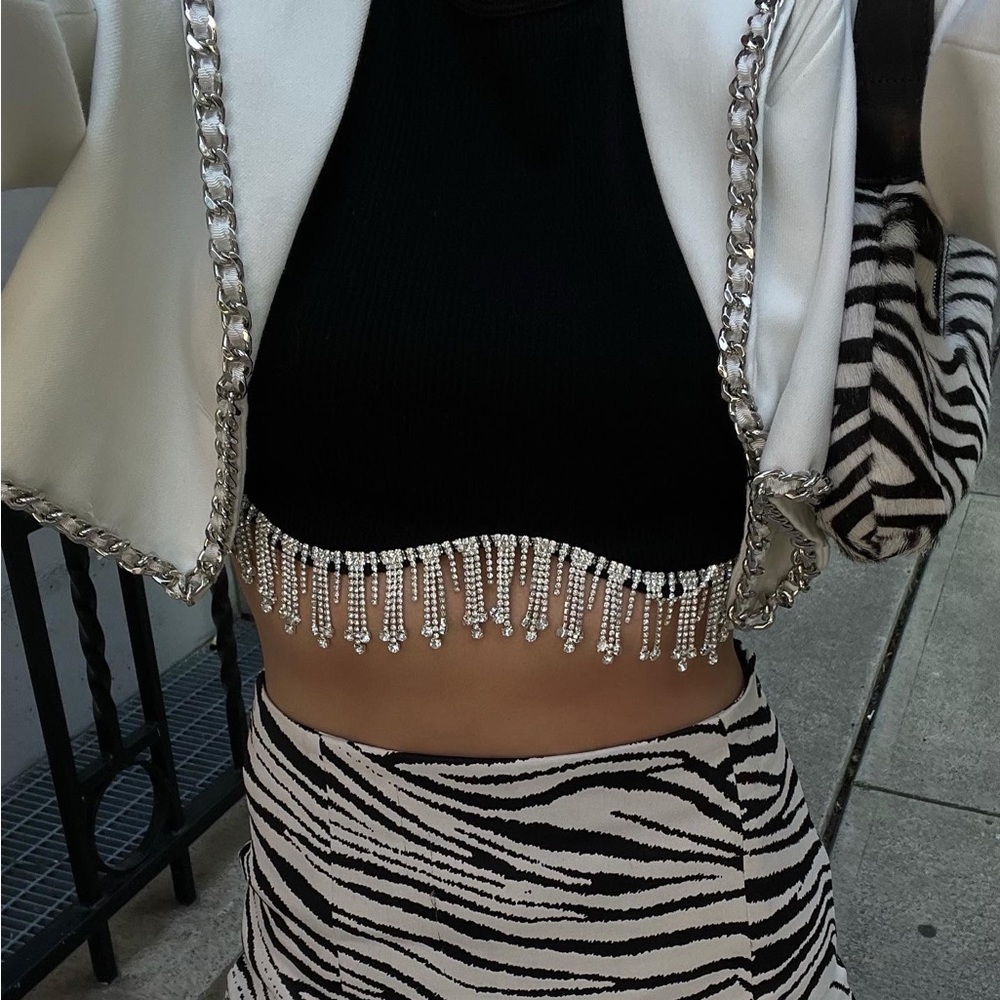 New condition VERAFIED NEW YORK chained blazer.
